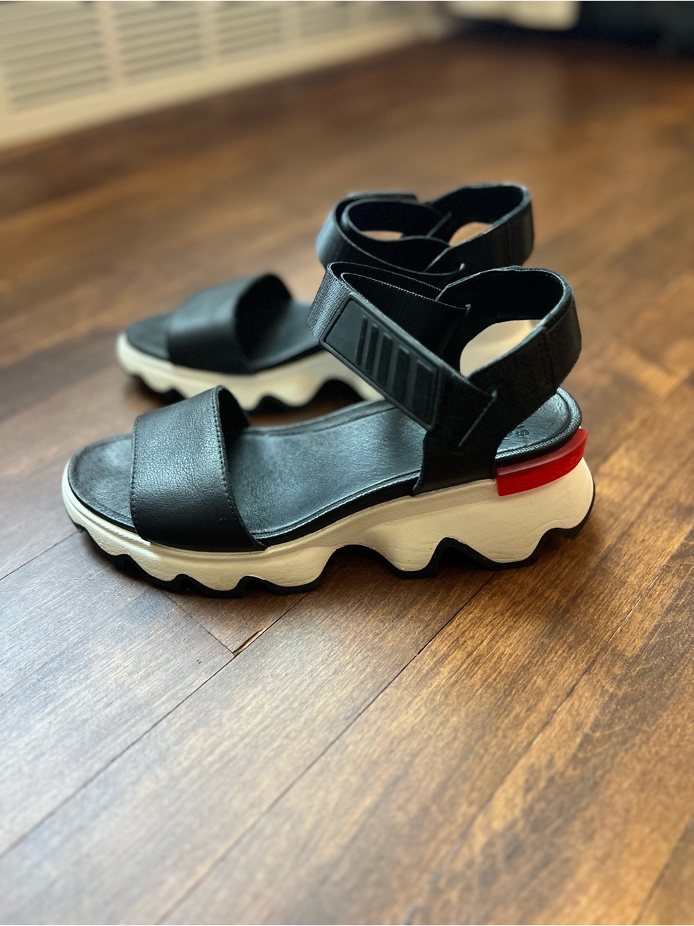 Sorel Black and White Platform Slide Sandals